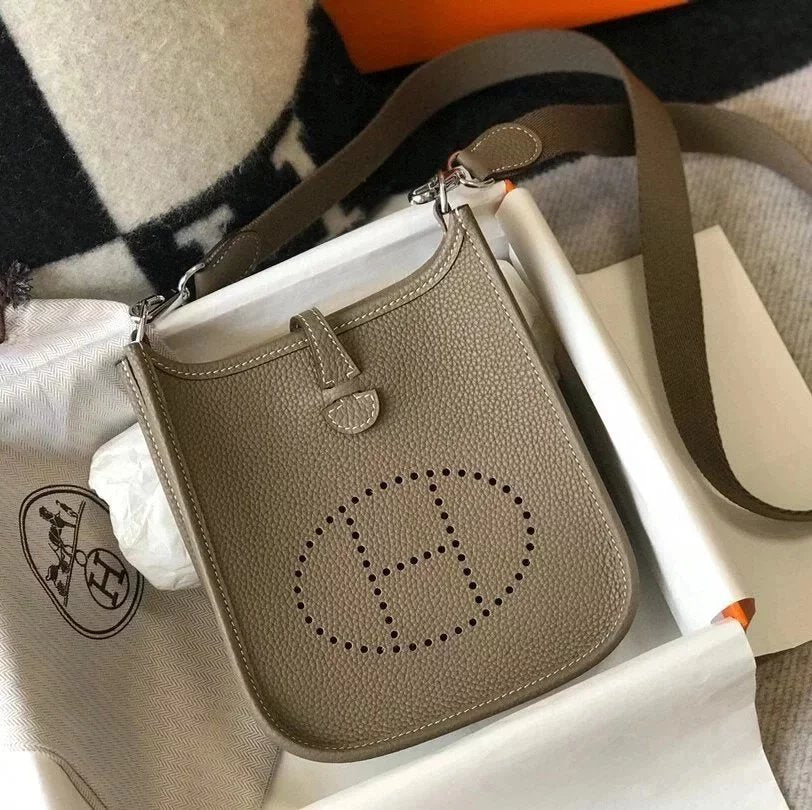 Hermes women's bag Top version New Beeswax Thread Sewing Handmade EvelyneminiH Home Mini Calfskin Hollow-out Evlin Bag Letter Punching Bag Elephant Gray Golden Brown Milkshake White and Black Shoulder Crossbody Buckle Women's Bag