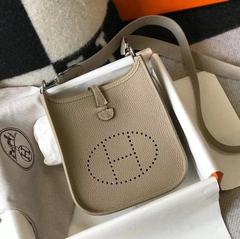 Hermes women's bag Top version New Beeswax Thread Sewing Handmade EvelyneminiH Home Mini Calfskin Hollow-out Evlin Bag Letter Punching Bag Elephant Gray Golden Brown Milkshake White and Black Shoulder Crossbody Buckle Women's Bag