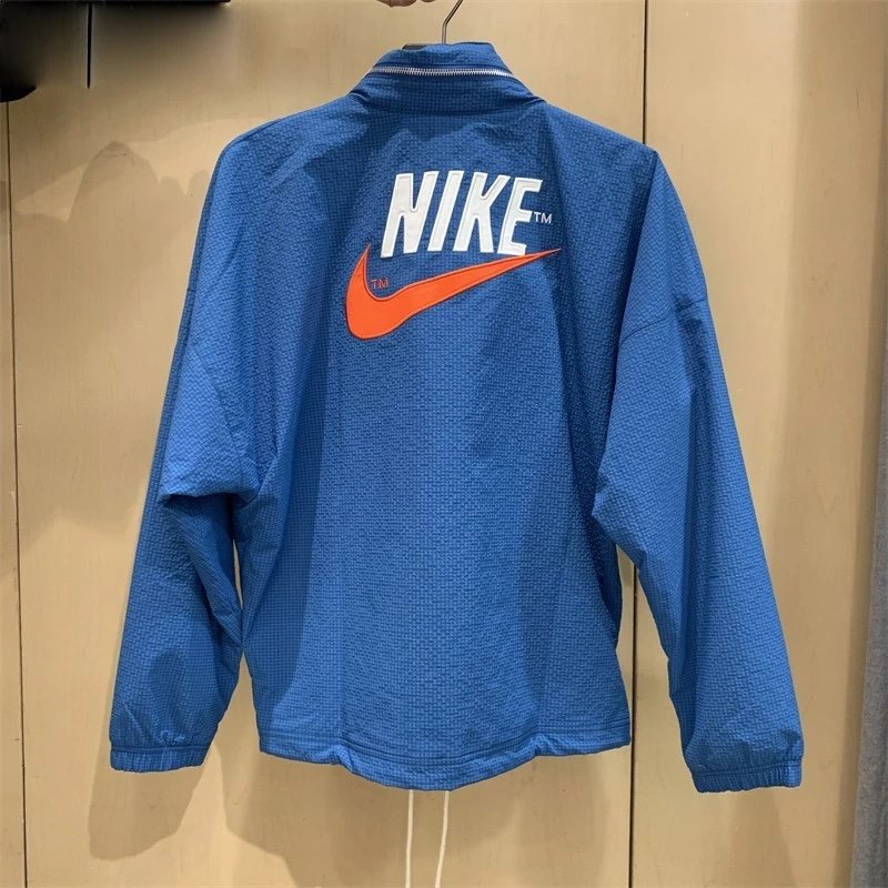 Nike Jackets Spring and Summer Woven Hidden Hat Large Standard Windproof Jacket Sports Stand Collar Jacket for Men and Women DM5286