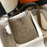 Hermes women's bag Top version New Beeswax Thread Sewing Handmade EvelyneminiH Home Mini Calfskin Hollow-out Evlin Bag Letter Punching Bag Elephant Gray Golden Brown Milkshake White and Black Shoulder Crossbody Buckle Women's Bag