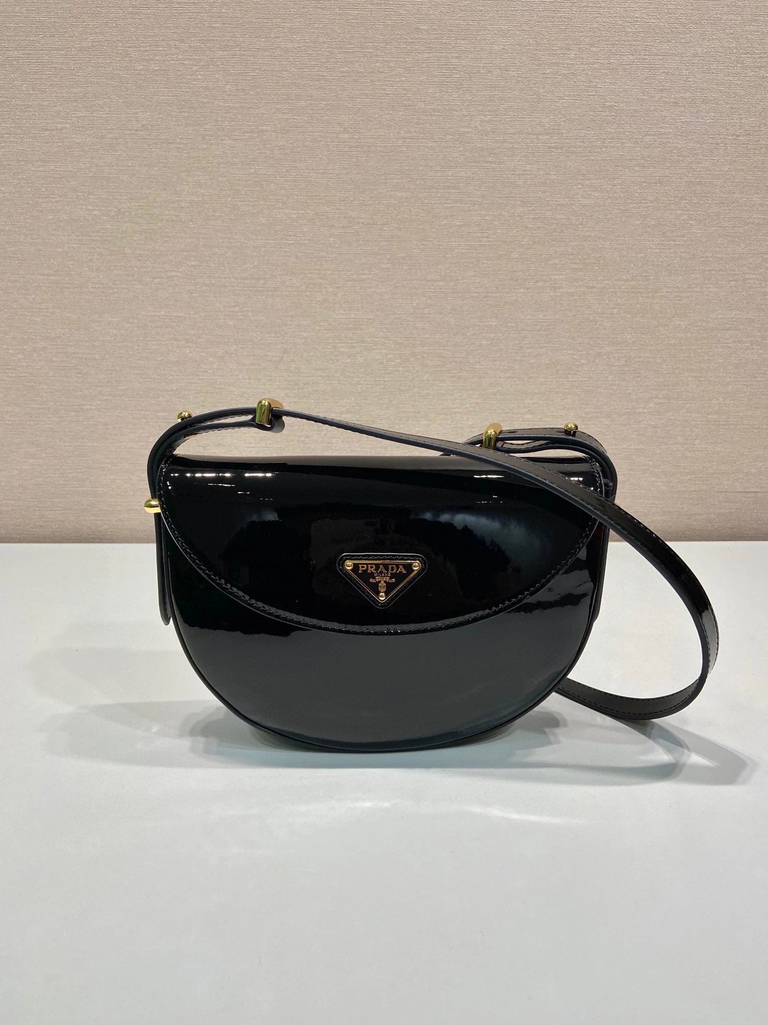 PRADA Bag Top version Version Latest Patent Leather Saddle Bag Enamel Triangle Metal Logo Badge Patent Leather Underarm Bag Shoulder Strap Adjustable Calfskin Chain Bag Crossbody Bag Shoulder Bag Underarm Bag Handbag Women Bag Red and Black1BA349