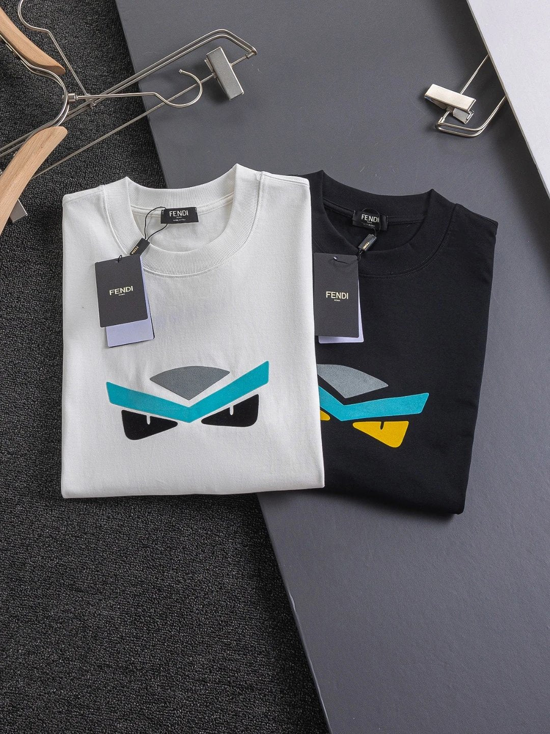 FENDI T-shirt Blue eyebrows and black eyes print on the chest logo round Neck Short Sleeve25ss New Pure Cotton Unisex Style T T-shirt OS Loose Fit Base Shirt Top Half Sleeve T-Shirt