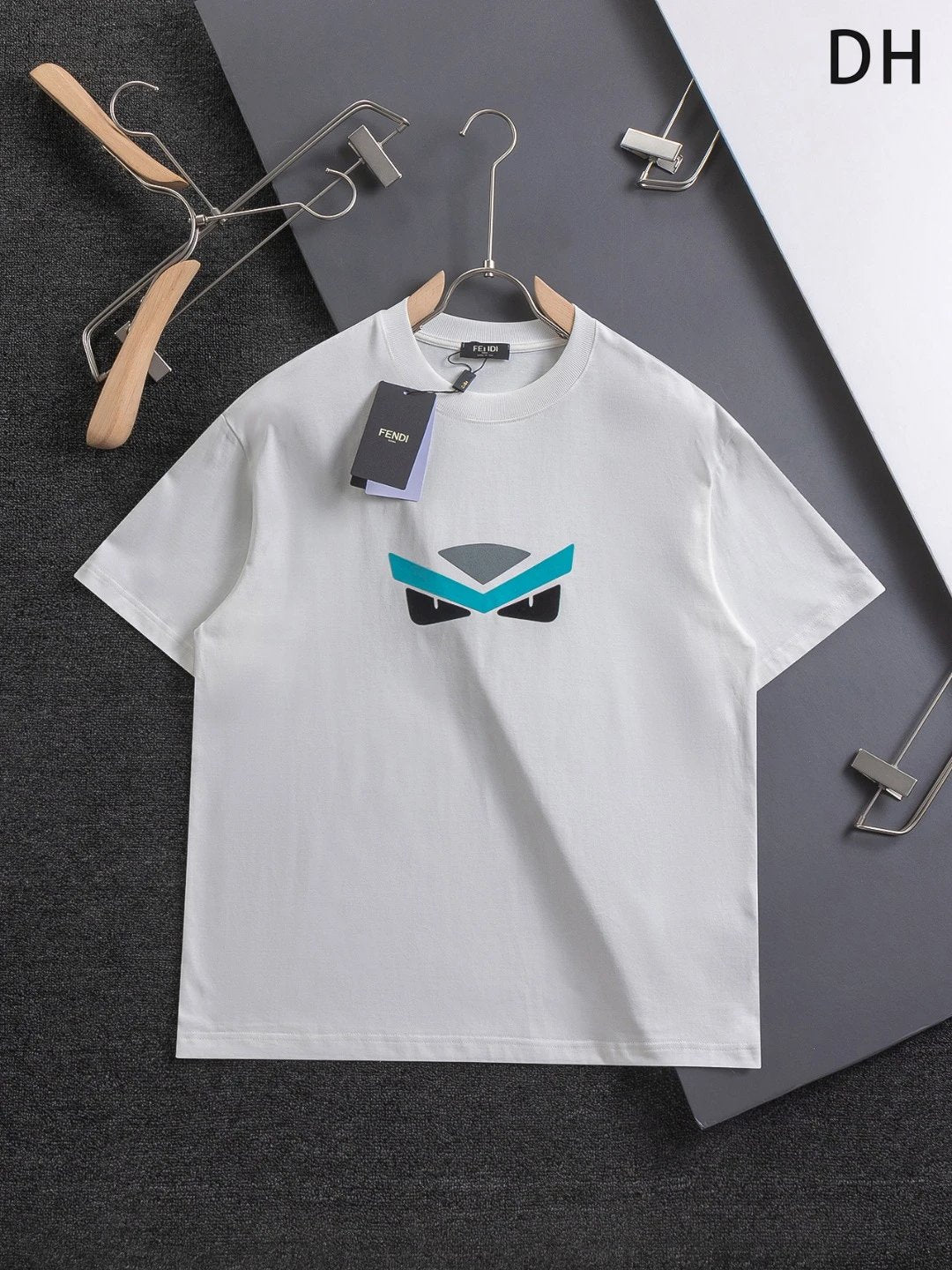 FENDI T-shirt Blue eyebrows and black eyes print on the chest logo round Neck Short Sleeve25ss New Pure Cotton Unisex Style T T-shirt OS Loose Fit Base Shirt Top Half Sleeve T-Shirt