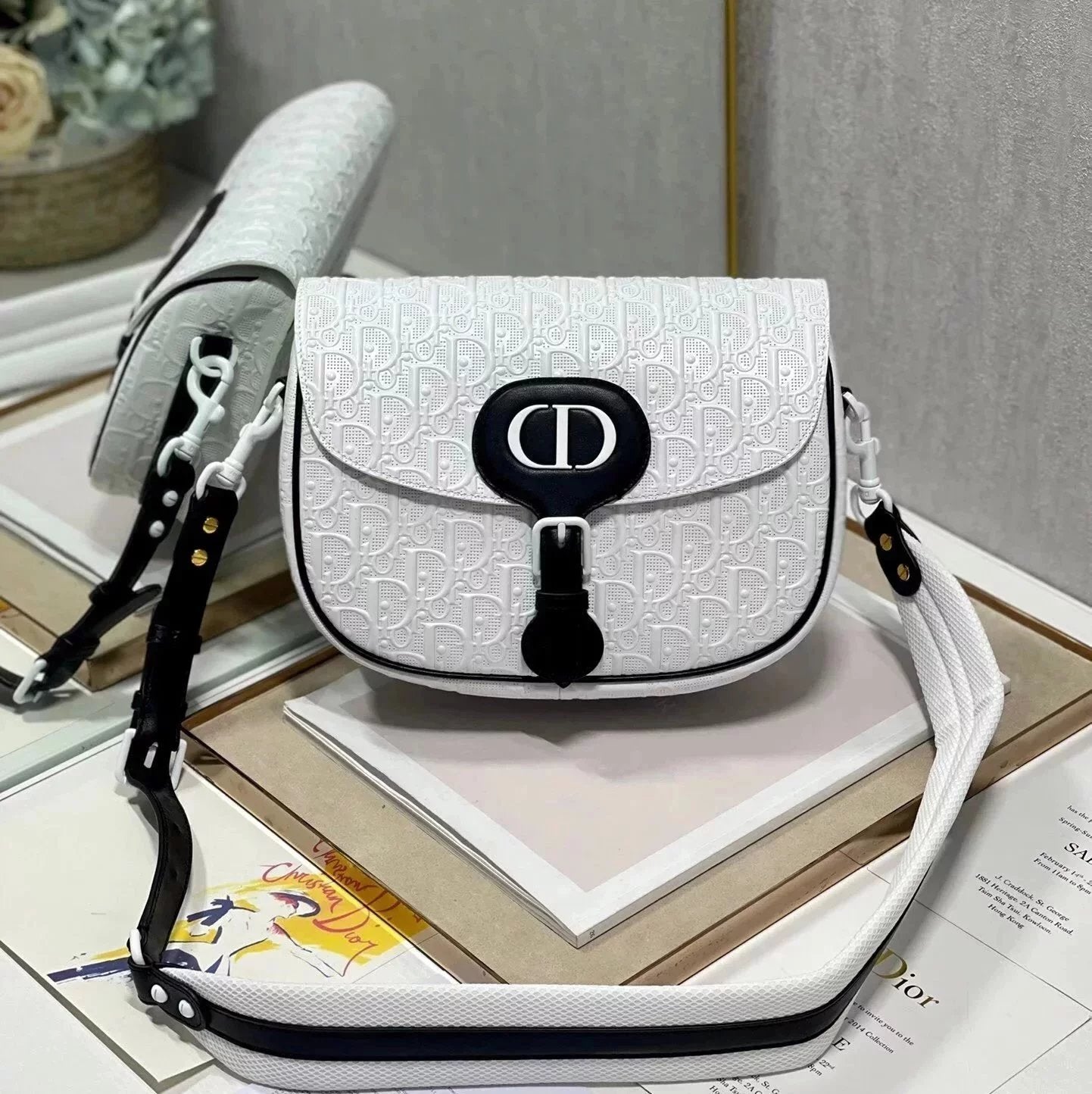 Dior Women's Bag Top version 【Original Leather】2022New Bobby Handbag Hollow Bobbi Bag Black and White Panda Color Matching Shoulder Messenger Bag Made of Hollow Cow Leather Oblique Printing Effect New Women's Bag Selenodont Bag Crossbody Bag Saddle Bag