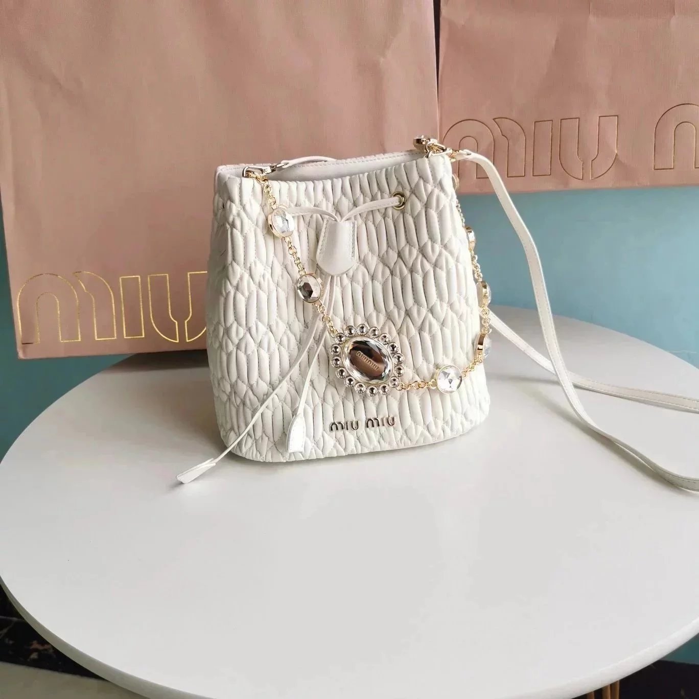 Miu Miu Bag Top version Diamond Bucket Bag2022New Drawstring Bucket Bag9K Glass Stone Crystal Drill Chain5BE050New Crystal Chain Bucket Bag Imported Matelasse Lambskin Classic Embossed Small Flower Removable Metal Imitation Crystal Chain and Leather Lengt