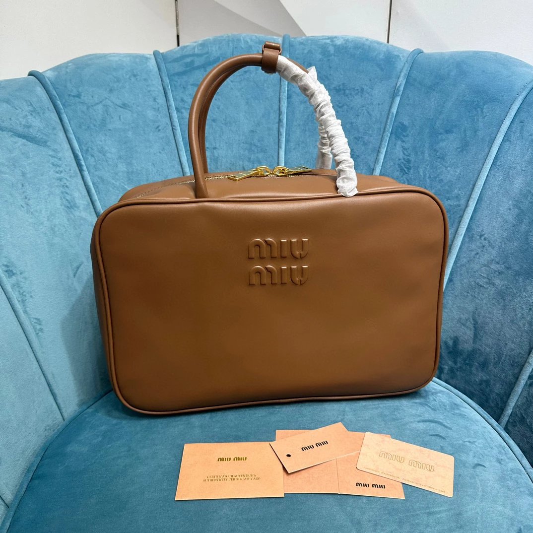 Miu Miu Bag Top version 【Level Surrogate Shopping】Miu New Bowling Bag Imported Calfskin Large Capacity Men's and Women's Same Casual Fashion Commuter Handbag Briefbag Shoulder Messenger Bag