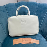 Miu Miu Bag Top version 【Level Surrogate Shopping】Miu New Bowling Bag Imported Calfskin Large Capacity Men's and Women's Same Casual Fashion Commuter Handbag Briefbag Shoulder Messenger Bag