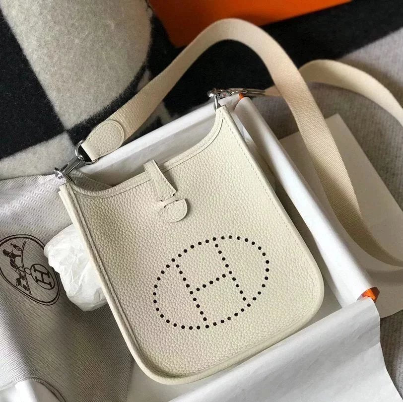 Hermes women's bag Top version New Beeswax Thread Sewing Handmade EvelyneminiH Home Mini Calfskin Hollow-out Evlin Bag Letter Punching Bag Elephant Gray Golden Brown Milkshake White and Black Shoulder Crossbody Buckle Women's Bag