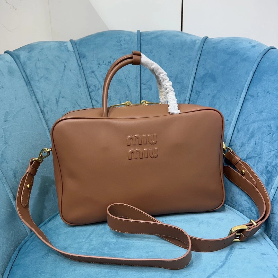 Miu Miu Bag Top version 【Level Surrogate Shopping】Miu New Bowling Bag Imported Calfskin Large Capacity Men's and Women's Same Casual Fashion Commuter Handbag Briefbag Shoulder Messenger Bag