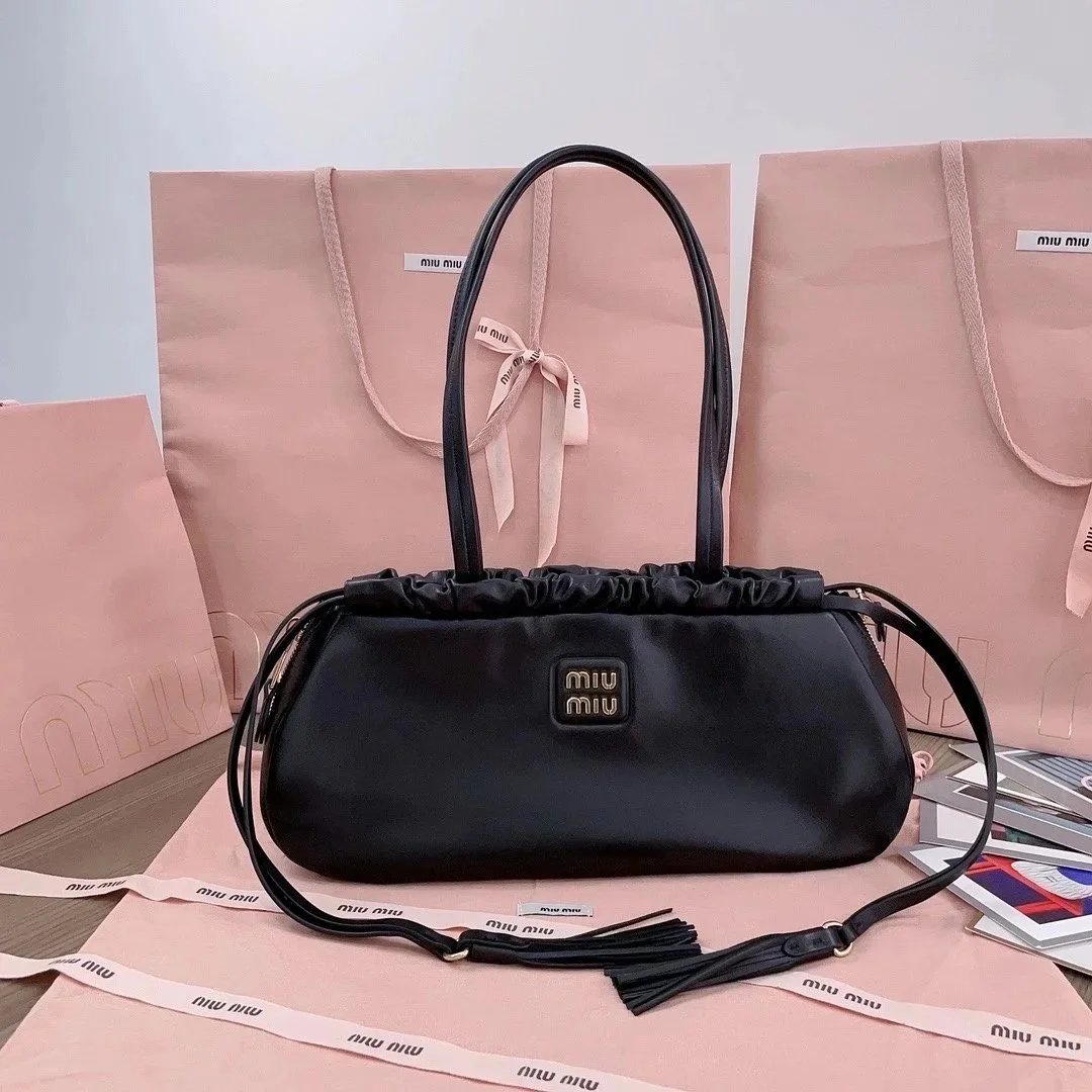 Miu Miu Bag Top version 【Premium Version Original Leather】5BG28724New Tassel Underarm Bag Original Soft Glutinous Calfskin Handbag Women's Bag Tassel Drawstring Bag Mouth Baguette Bag New Tassel Bag French Stick Underarm Bag