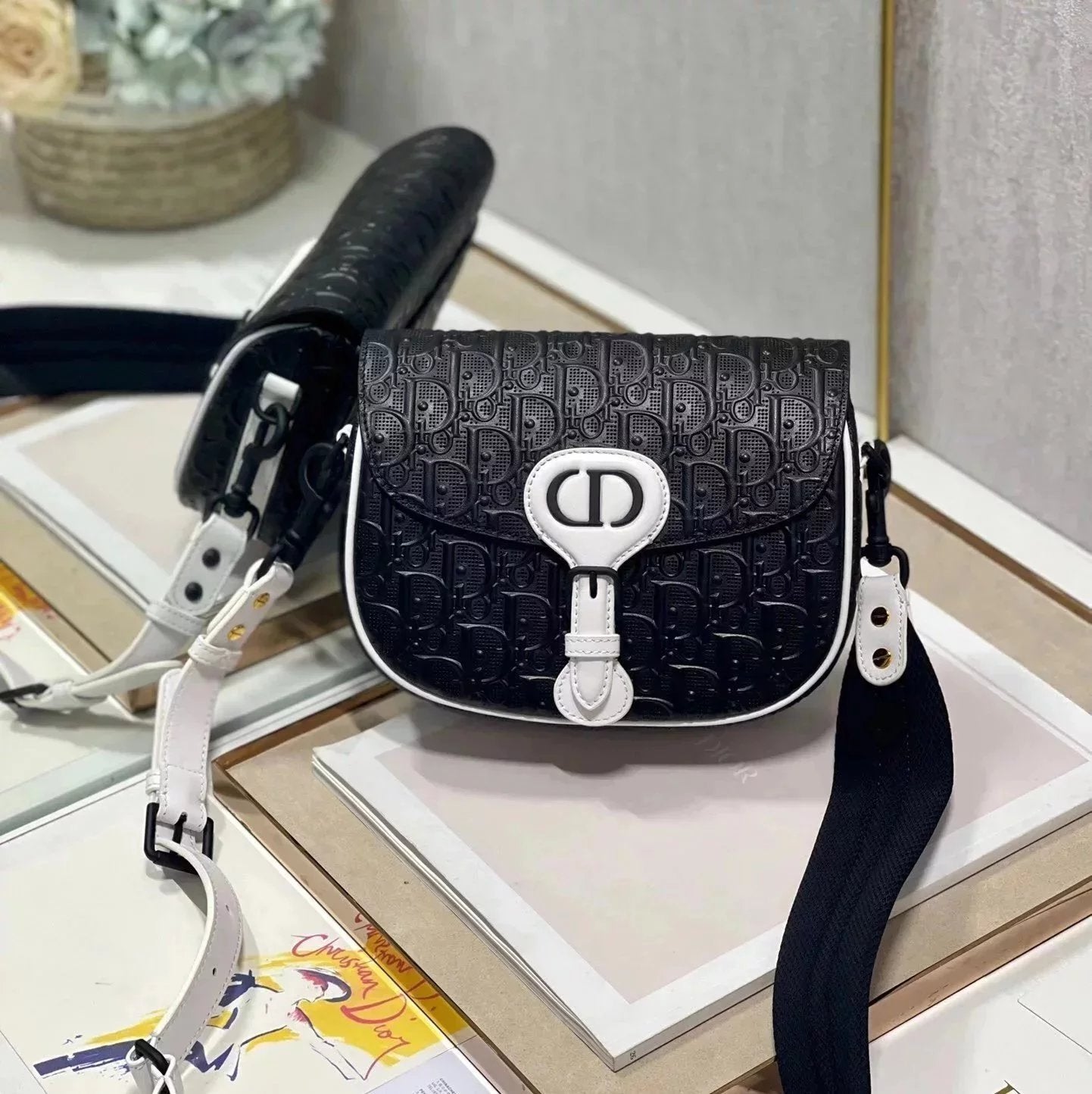 Dior Women's Bag Top version 【Original Leather】2022New Bobby Handbag Hollow Bobbi Bag Black and White Panda Color Matching Shoulder Messenger Bag Made of Hollow Cow Leather Oblique Printing Effect New Women's Bag Selenodont Bag Crossbody Bag Saddle Bag