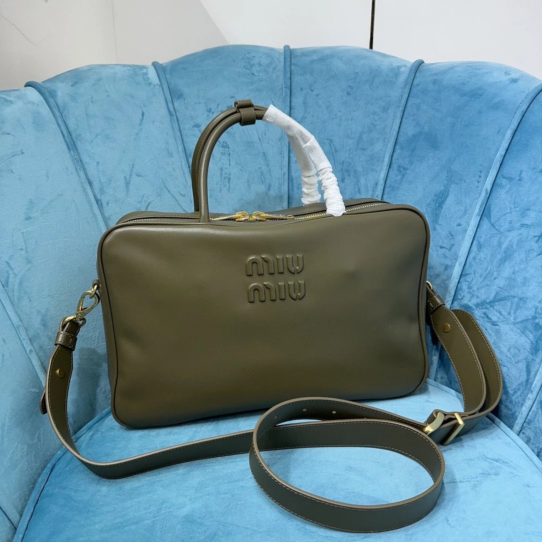 Miu Miu Bag Top version 【Level Surrogate Shopping】Miu New Bowling Bag Imported Calfskin Large Capacity Men's and Women's Same Casual Fashion Commuter Handbag Briefbag Shoulder Messenger Bag