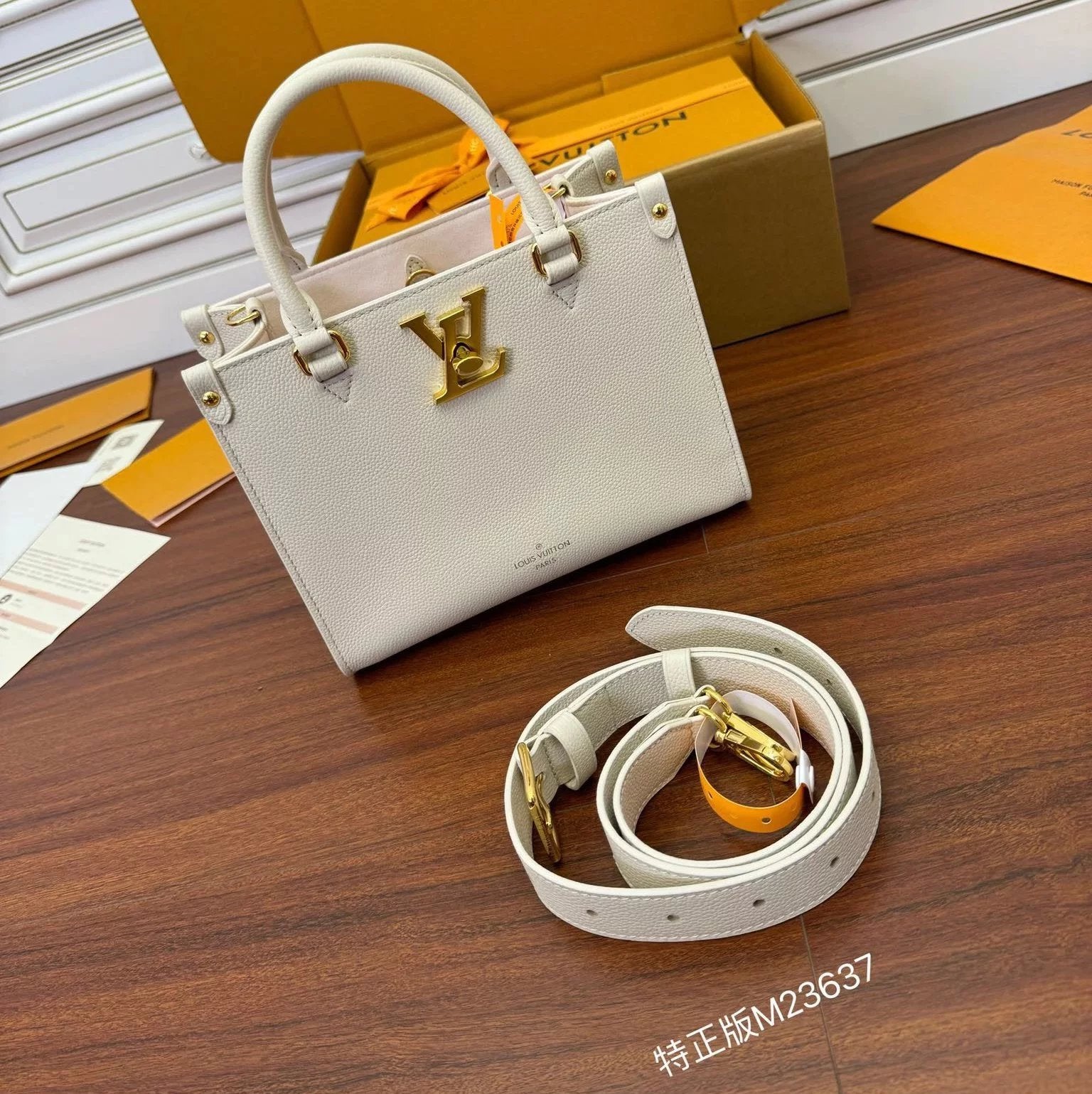 Louis Vuitton LV Women's Bag Top version M22311Black M23637White Full Leather Cubic Bag LockGo Shoulder Crossbody Handbag Large Capacity Briefcase